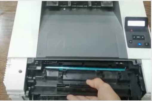 Firstly, open the printer cover of the cartridge unit area.